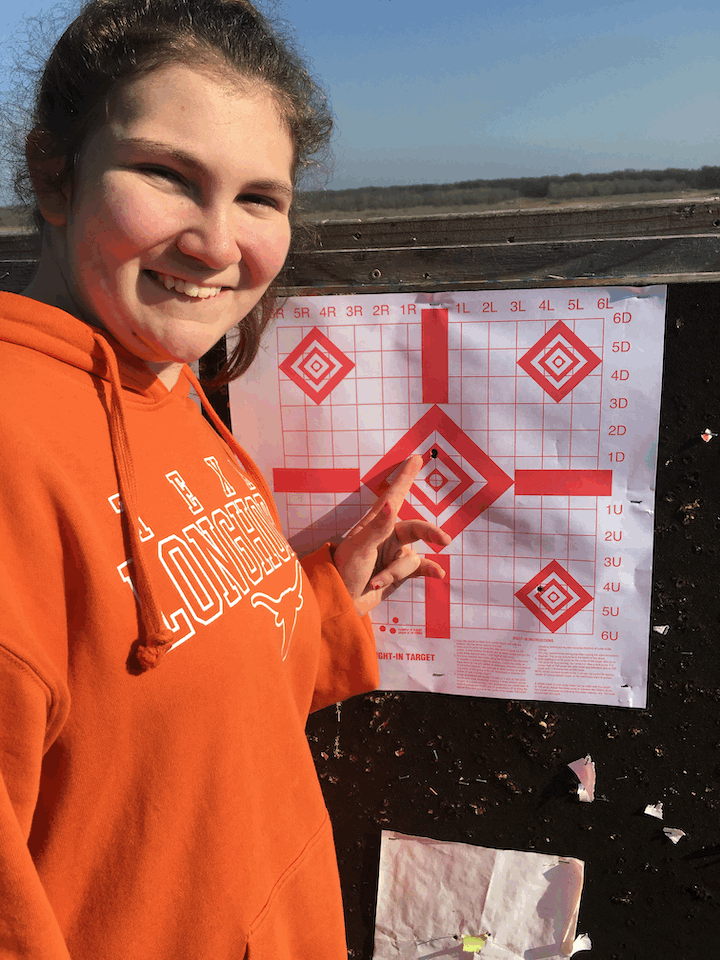 eleven year old girl shoots one hole 3 shot group first time firing a high power rifle